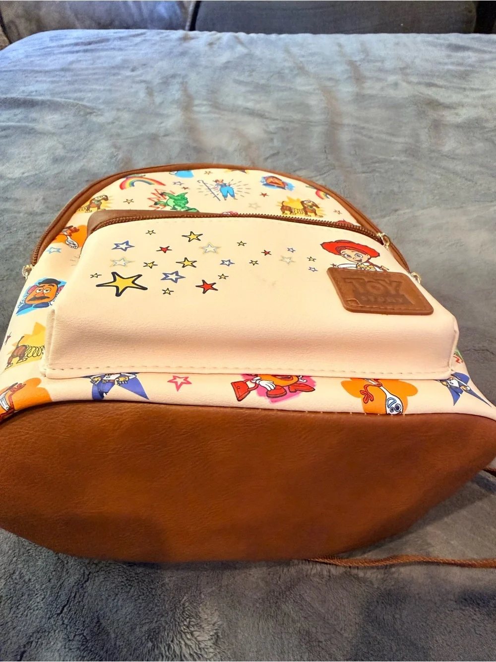 Disney Cream Toy Story Character Mini Backpack with Brown Trim